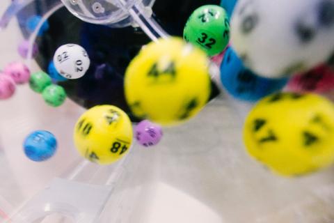 Coloured lottery balls bouncing